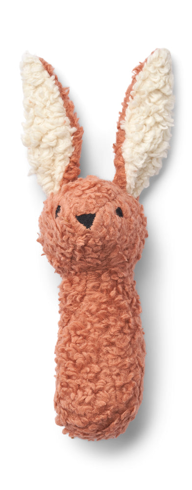Image d'un doudou hochet en peluche douce.