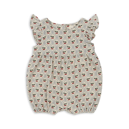 Barboteuse Konges Slojd Coco Frill en mousseline légère, 100% coton biologique, volants décoratifs, boutons ouvrables, tailles 1 mois à 3 ans