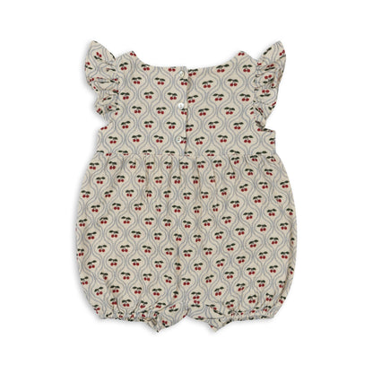 Barboteuse Konges Slojd Coco Frill en mousseline légère, 100% coton biologique, volants décoratifs, boutons ouvrables, tailles 1 mois à 3 ans